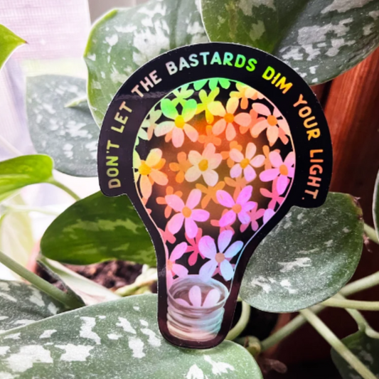 Don't Let the Bastards Dim Your Light Sticker