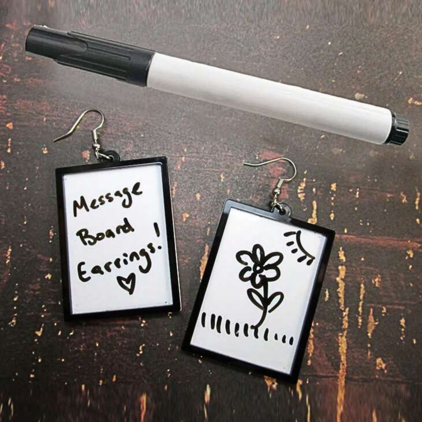 Whiteboard earrings and marker